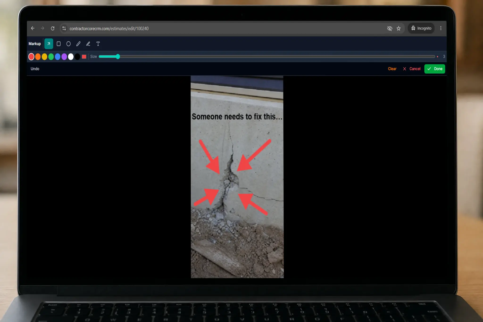Contractor CRM Software With Photo Editor - CRM You Can Edit Images In - CRM With Photo Markups — laptop showing the ContractorCore photo markup editor on desktop with red arrows and text annotations on a cracked concrete photo